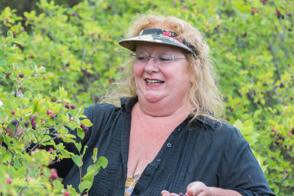 Mom-picking-June-Berries-Manitoba